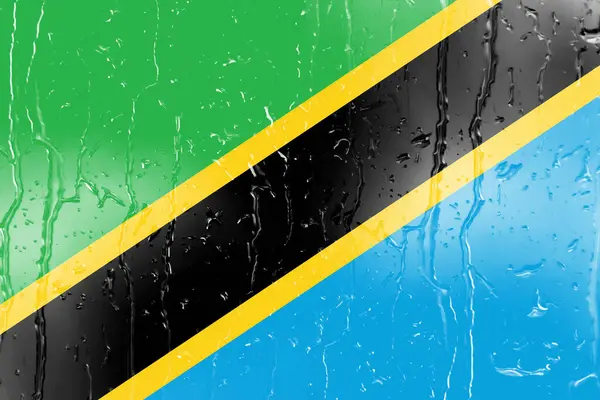 Flagga Tanzania Ett Glas Med Vatten Droppe Bakgrund — Stockfoto