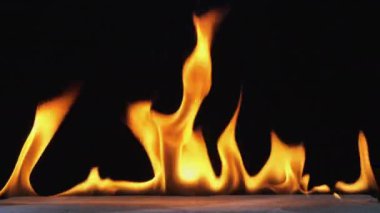 The fire is burning on a brick