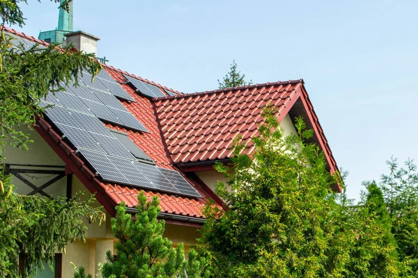 stock image Historic farm house with modern solar panels on roof and wall High quality photo