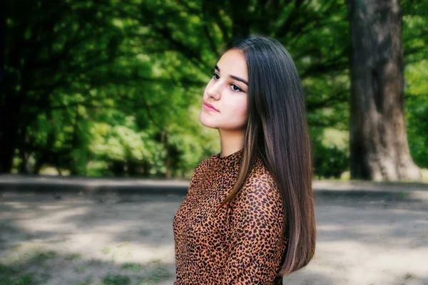 Emotional Girl Teenager Long Hair Hairstyle Braids Green Shirt Sits — Stock Photo, Image