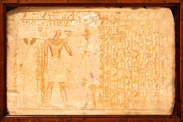 Old Egyptian hieroglyphs on an ancient background. Wide historical background. Ancient Egyptian hieroglyphs as a symbol of the history of the Earth. . High quality photo