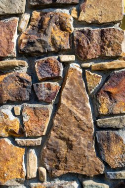 Kirli Duvar Gri Taş 'tan yapılmıştı. Eski taş duvar arkaplanı. Benzersiz desenli beton dış duvar. Yüksek kalite fotoğraf