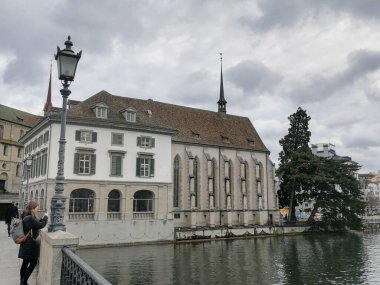 Scenic summer view of the Old Town architecture of Zurich with the bridge Untertorbryukke over Aare river, Zurich, Switzerland. High quality photo clipart