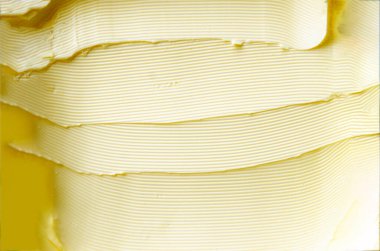 Sarı tereyağı arkaplan ve doku. Tereyağı dokusu arka planı. Yüksek kalite fotoğraf.