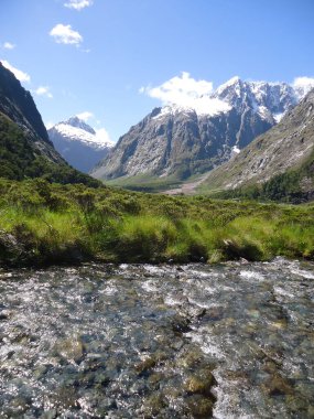 Mountain and valley in Fiordland National Park, South Island, New Zealand.