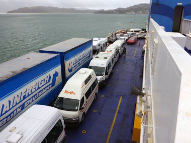 Ferry between North and South Island, leaving the harbor in Wellington, North Island, New Zealand.