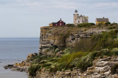 The lighthouse at the Island Stora Karlso, Gotland, Sweden. clipart