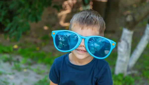 stock image Children enjoy nature in glasses. Selective focus. Nature.