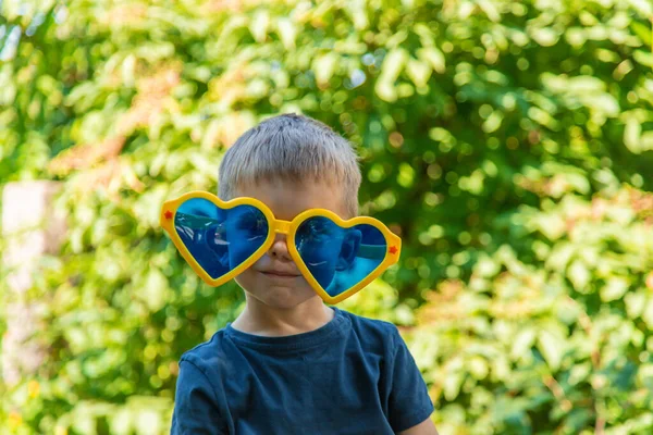 stock image Children enjoy nature in glasses. Selective focus. Nature.