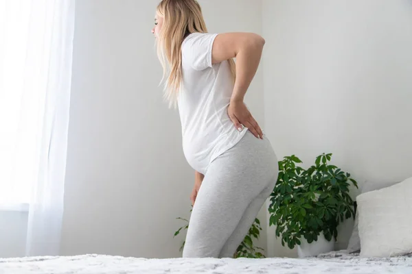 Pregnant Woman Hurts Her Back Selective Focus Home — Stock Photo, Image