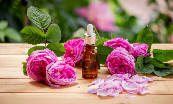 rose flower and essential oil. Spa and aromatherapy. Selective focus