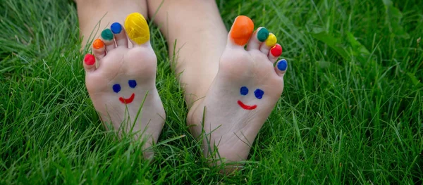 Boy Grass Painted Smile His Feet Selective Focus Nature — Stock Photo, Image