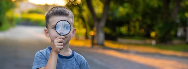 Boy Looks Magnifying Glass Selective Focus Nature — Stock Photo, Image