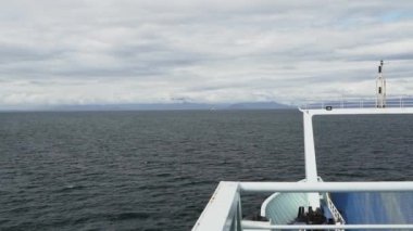 slow motion of a car ferry crossing the fjords of the carretera austral along the pacific coastline in Patagonia, Chile