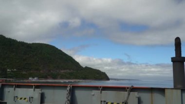 Hornopiren, Chile - 12 27 2018: slow motion of a car ferry crossing the fjords of the carretera austral along the pacific coastline in Patagonia, Chile