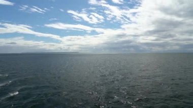 slow motion of a car ferry crossing the fjords of the carretera austral along the pacific coastline in Patagonia, Chile