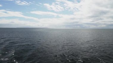 slow motion of a car ferry crossing the fjords of the carretera austral along the pacific coastline in Patagonia, Chile