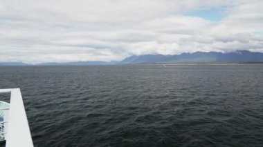 slow motion of a car ferry crossing the fjords of the carretera austral along the pacific coastline in Patagonia, Chile