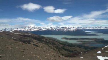 Landscape of the andes mountains close to Perito Moreno glacier in El Calafate, Patagonia, Argentina, with turquoise lake and snow covered mountains.