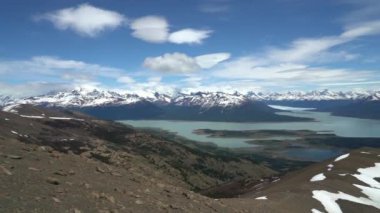 Landscape of the andes mountains close to Perito Moreno glacier in El Calafate, Patagonia, Argentina, with turquoise lake and snow covered mountains.