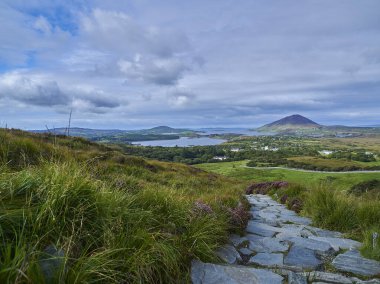 Diamond hill in the landscape of the lush and green Connemara National Park, a popular travel destination for hiking and recreation in Ireland.