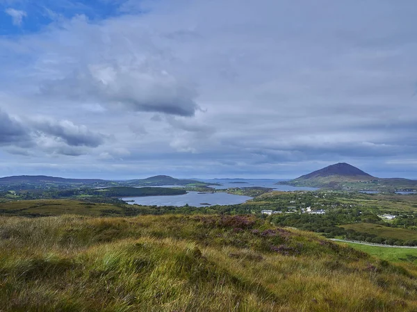 Diamond hill in the landscape of the lush and green Connemara National Park, a popular travel destination for hiking and recreation in Ireland.