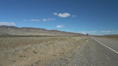 vast dry and arid landscape of patagonia in Argentina, South America, on clear and sunny day.