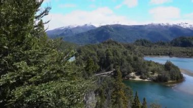 tranquil turquoise lake at the los alerces national park in Patagonia, Argentina.