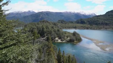 tranquil turquoise lake at the los alerces national park in Patagonia, Argentina.