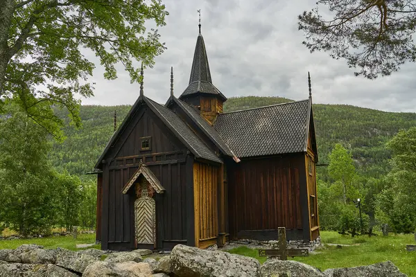 stock image Telemark, Norway - 06 16 2022: small Stave Church entirely built out of wood, located in Telemark in Norway.