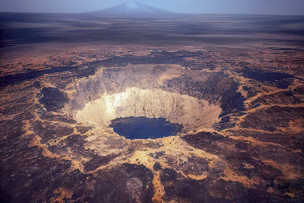 Large Impact Crater on a Barren Landscape