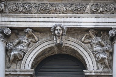 decorated arch of a passageway in Venice at San Marco square