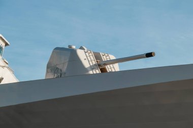 Cannon on board an army warship. Armament of a battleship.