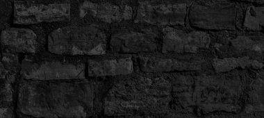 Dark banner of vintage brick wall texture. Old brick wall banner close-up.