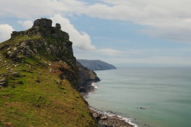 Rocky ocean shore with high mountains. Rocky sea coast