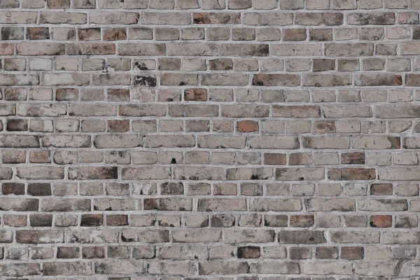 Brick wall texture. Beige brick pattern background.