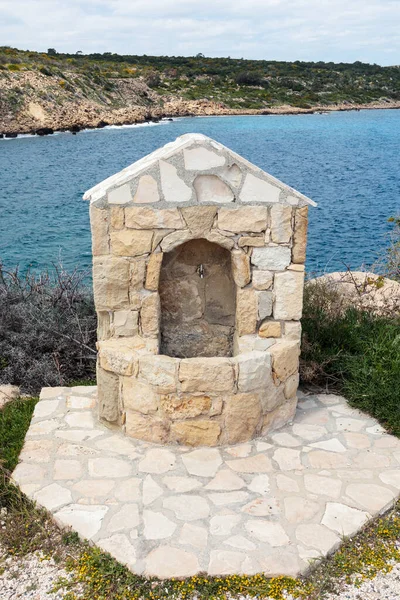 stock image Water faucet on the coast. A public place with freely available water for those enjoying nature.