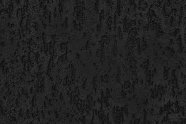 Kırışık alçılı siyah beyaz duvar dokusu. Taş yüzey, eski sert beton duvar. Tasarım ve şablon için alanı olan koyu gri grunge arkaplanı.