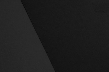 Kağıt dokusu koyu siyah ve gri tonlarda. El işi kağıt dokusundan gelen koyu tonlar.