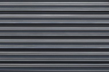 Bükülmüş metal levhanın dalgalı demir arka planı, desenli metal deseni..