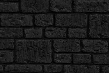Eskimiş taş blokların desenli arka planı. Siyah taş duvar deseni.