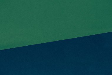 Mavi ve yeşil renklerin kağıt dokusu. İki renkli kağıt arkaplan.