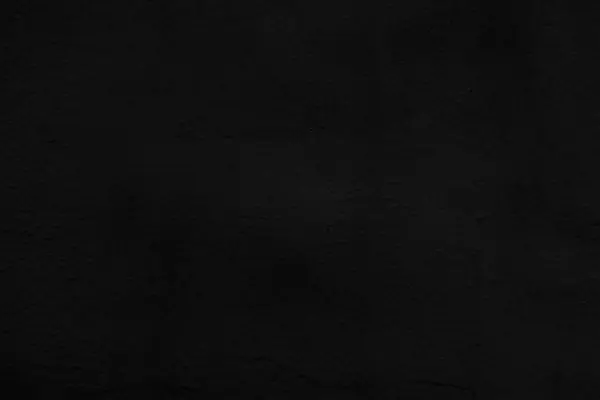 Karanlık duvar arkaplanı. Siyah kaba alçı dokusu.