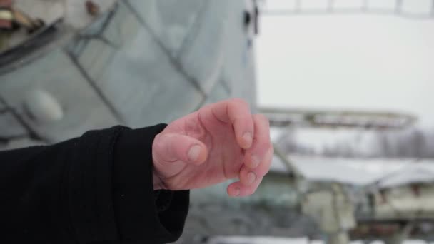 Left Hand Black Coat Stretches Out Its Fingers Background Airplane — Video