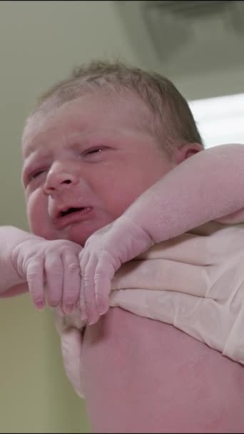 Vertical Video Doctors Hands White Gloves Hold Newly Born Crying — Stock Video