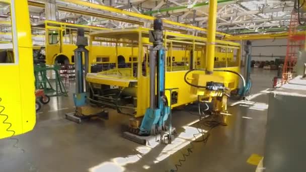 Conveyor Line Production Buses Yellow Frames Passenger Transport Aerial View — Stock Video
