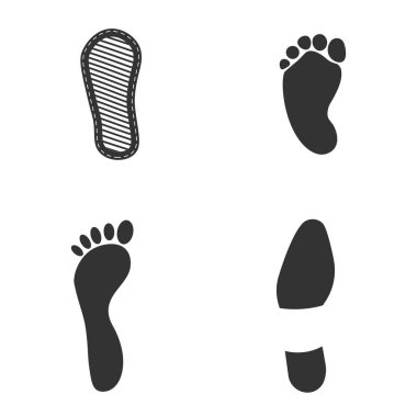 Set of humans footprint. Footprints silhouettes foot and shoes isolated on white background, such as idea of logo in gray. Different human footprints for your design. EPS10.	