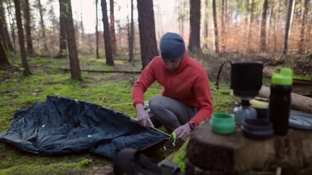 Man Hiker Sets Camping Tent Fall Forest Backpacking Expedition Traveler — Vídeo de Stock