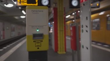 March 10, 2022. Berlin. Germany. Self service automatic ticket validating machine inside Berlin Subway. BVG. Public transportation ticket stamp machine in metro station, Berlin. Ticket validator. 