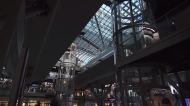 March 11, 2022. Berlin. Germany. Main station interior. Berlin Hauptbahnhof. People inside Berlin Central train station. Deutsche Bahn. General railway terminal Inside passengers, people and trains. 